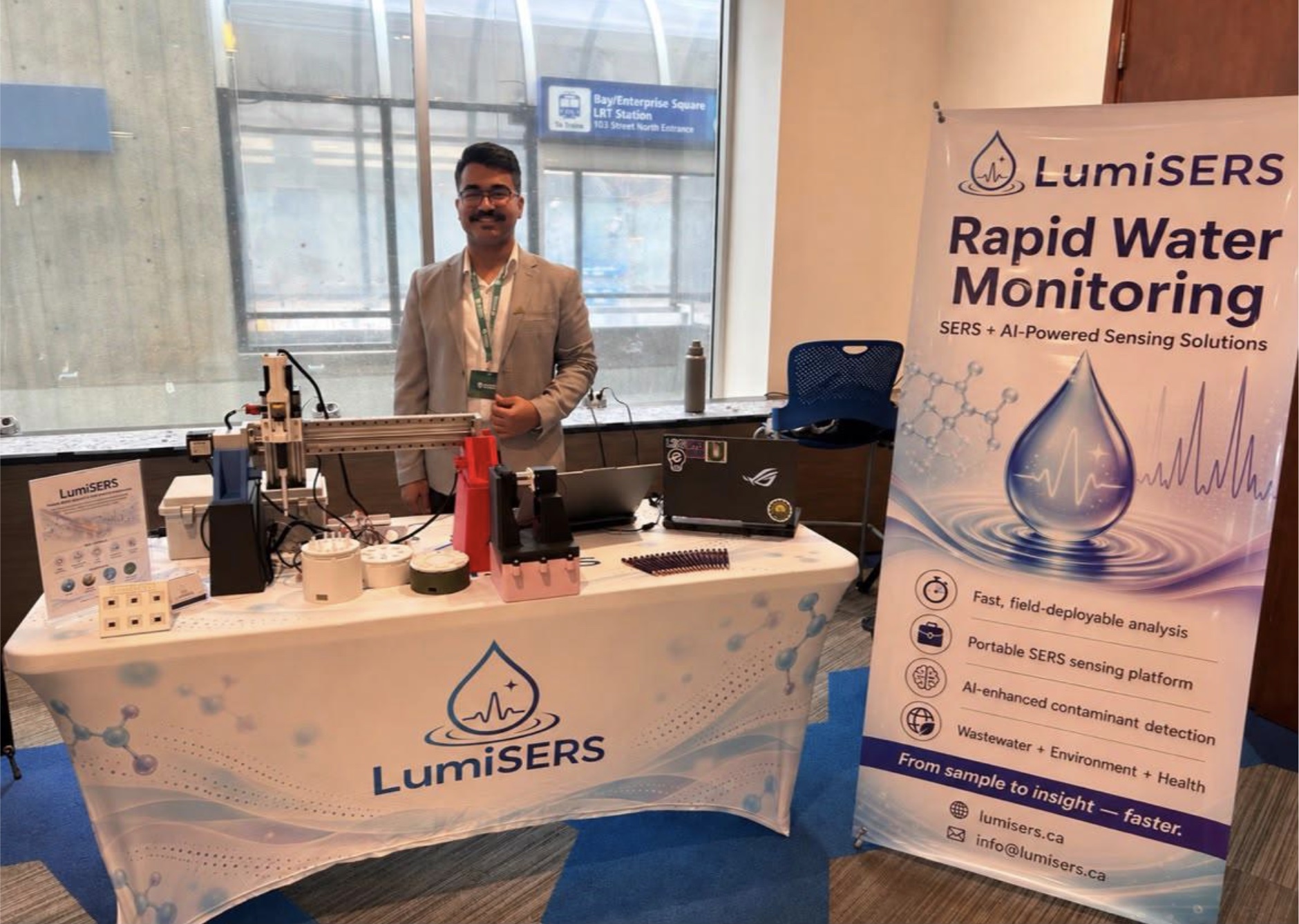 LumiSERS booth with the portable SERS sensing setup and Rapid Water Monitoring banner at the University of Alberta startup showcase